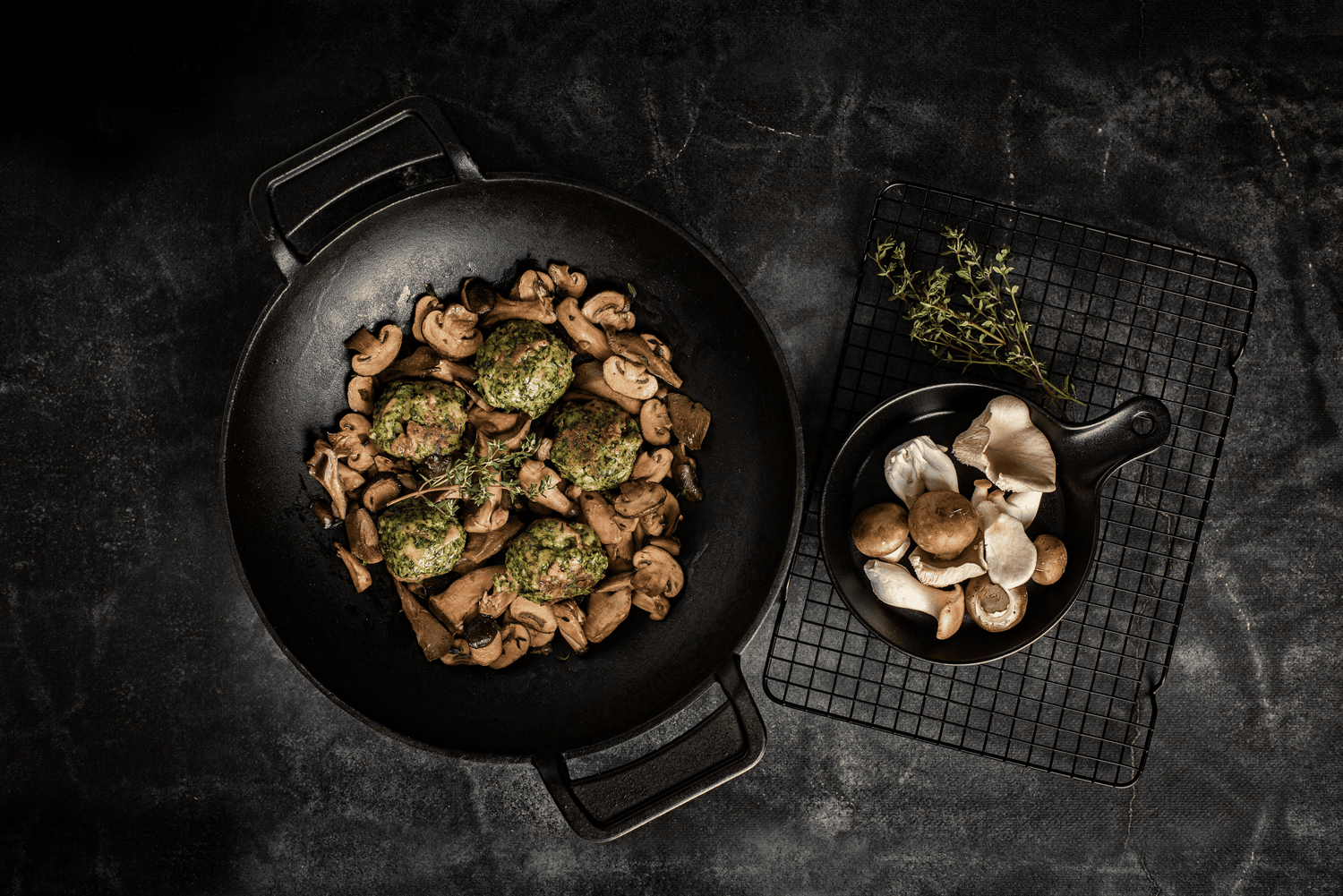 Spinatkäseknödel mit Pilzen